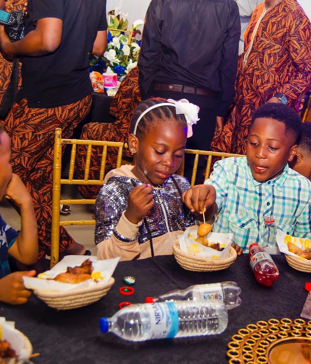 Children enjoying KAF Eatables party packs at a celebration